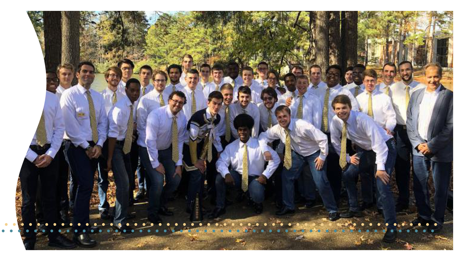 The Georgia Tech Glee Club standing in a group outside.