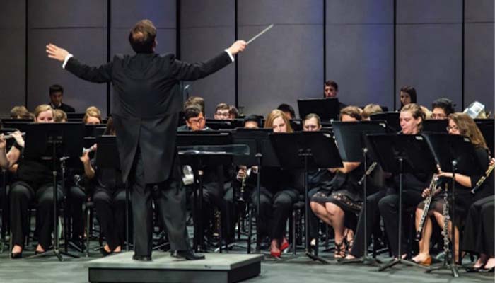 Symphonic band performs on stage