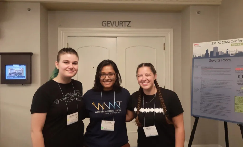 Three Women in Music Technology members at the 2022 SMPC conference.