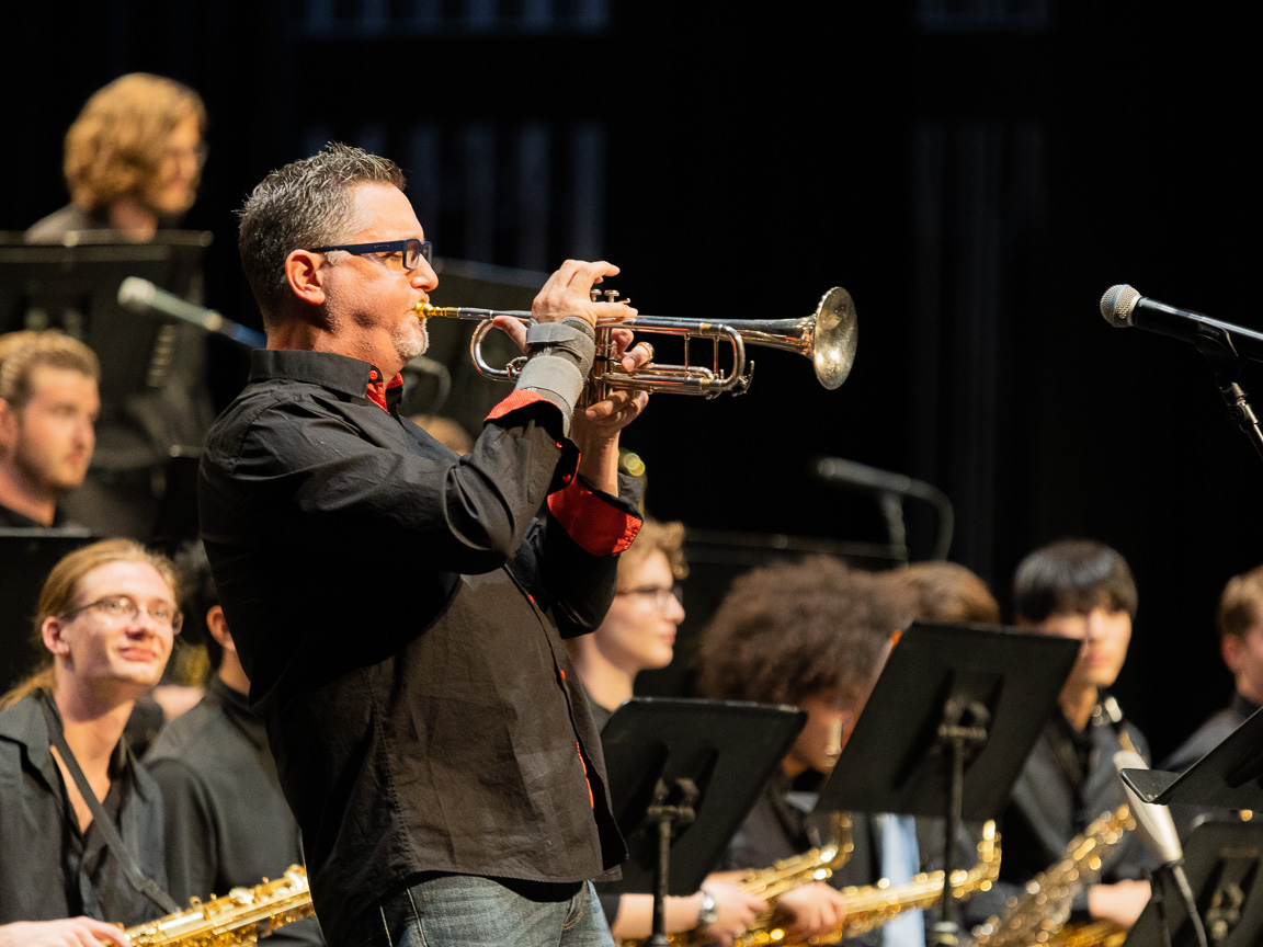 Photo of Rex Richardson playing trumpet onstage at Ferst Center for the Arts
