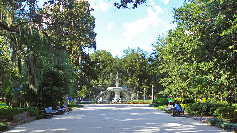 A fountain surrounded by trees in Forsyth Park, Savannah